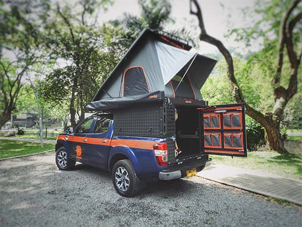 Renault Alaskan with built-up roof tent and opened rear door