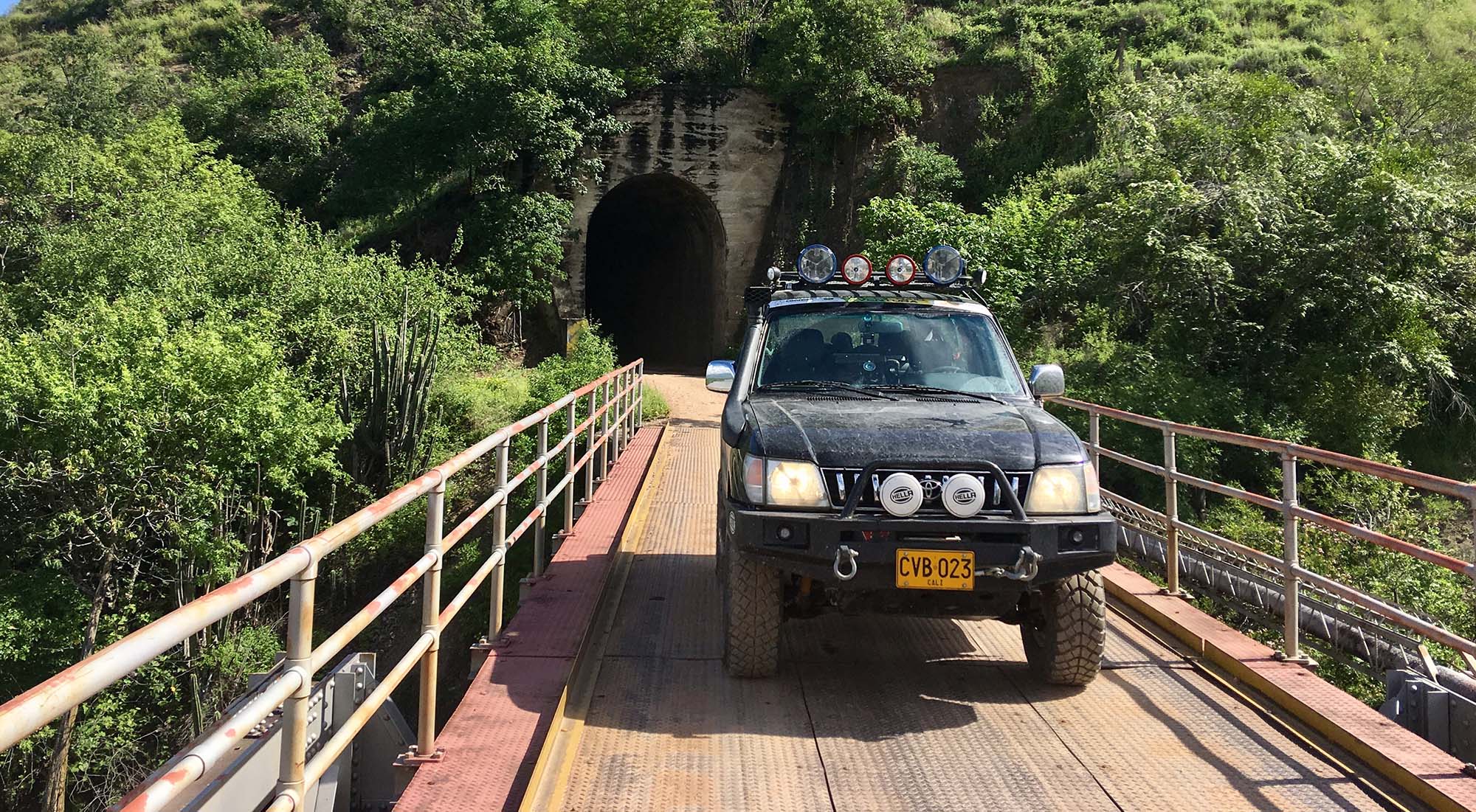 Off-road vehicle on a bridge